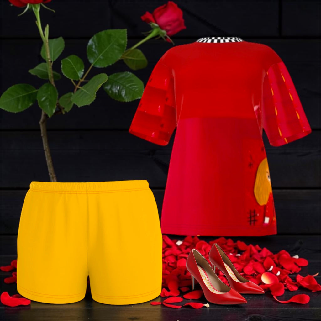 Image 2 — Styling set shot (with Scarlet Rule Tee + red heels): Golden Expression Art Vol IV The Golden Ease Short styled with The Scarlet Rule Tee and scarlet red stiletto heels — Stay Golden Edit editorial, dark backdrop with rose petals