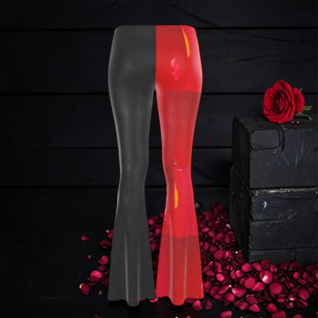 Image 3 (front view, scarlet red + slate grey): Vol IV — The Golden Gambit Flare Pants — front view, split-panel flare silhouette with scarlet red right leg and slate grey left leg, flared hem, rose petal dark editorial backdrop — Golden Expression Art