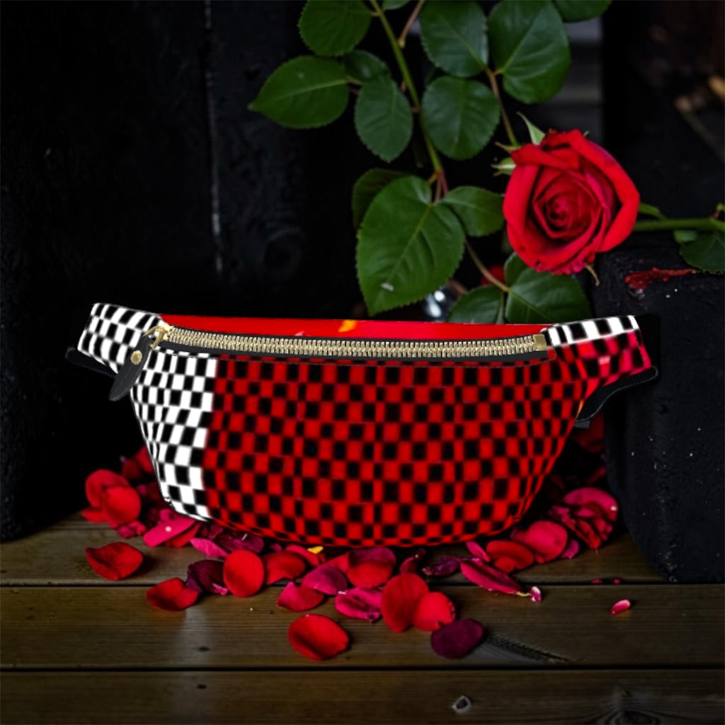 Image 2 (front closed): Vol IV — The Golden Riot Fanny Pack — front view, scarlet red & black checkered body with black & white checkered strap ends, gold zipper closure, black adjustable belt with gold buckle, rose petal dark editorial backdrop — Golden Expression Art