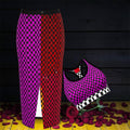 Vol IV — The Magenta Checkmate Set, front view, magenta & black checkered midi skirt with front slit paired with matching magenta & black checkered racerback bra top, black & white checkered trim detail, rose petal editorial — Golden Expression Art
