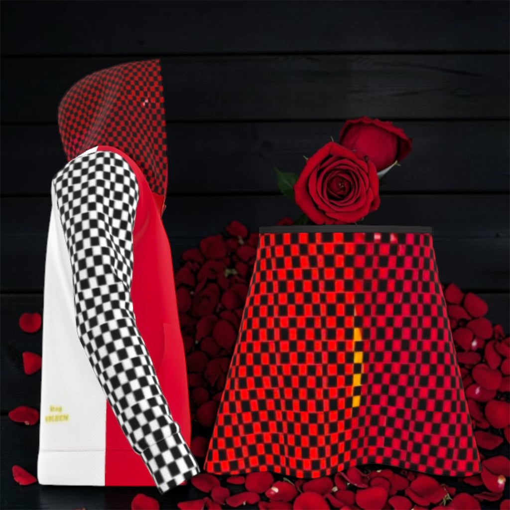 Image 1: Vol IV — The Red Rule Set — side-by-side editorial of red & black checkered hoodie with black & white checkered sleeve and red & black checkered mini skirt, rose petal dark backdrop — Golden Expression Art

