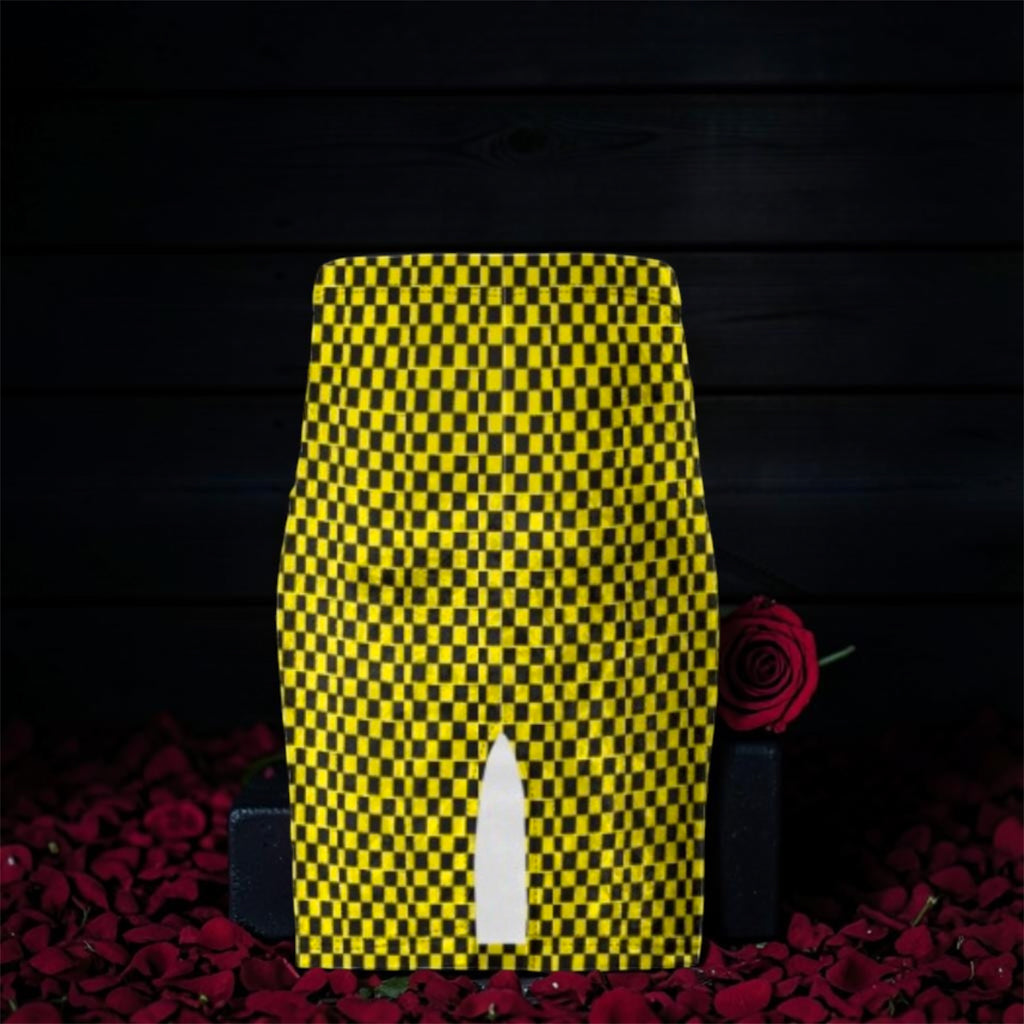 Image 2 (flat lay, yellow/black checkered): Vol IV — The Riot Skirt — flat lay front view, golden yellow & black checkered pencil skirt with center front slit, dark rose petal editorial backdrop — Golden Expression Art