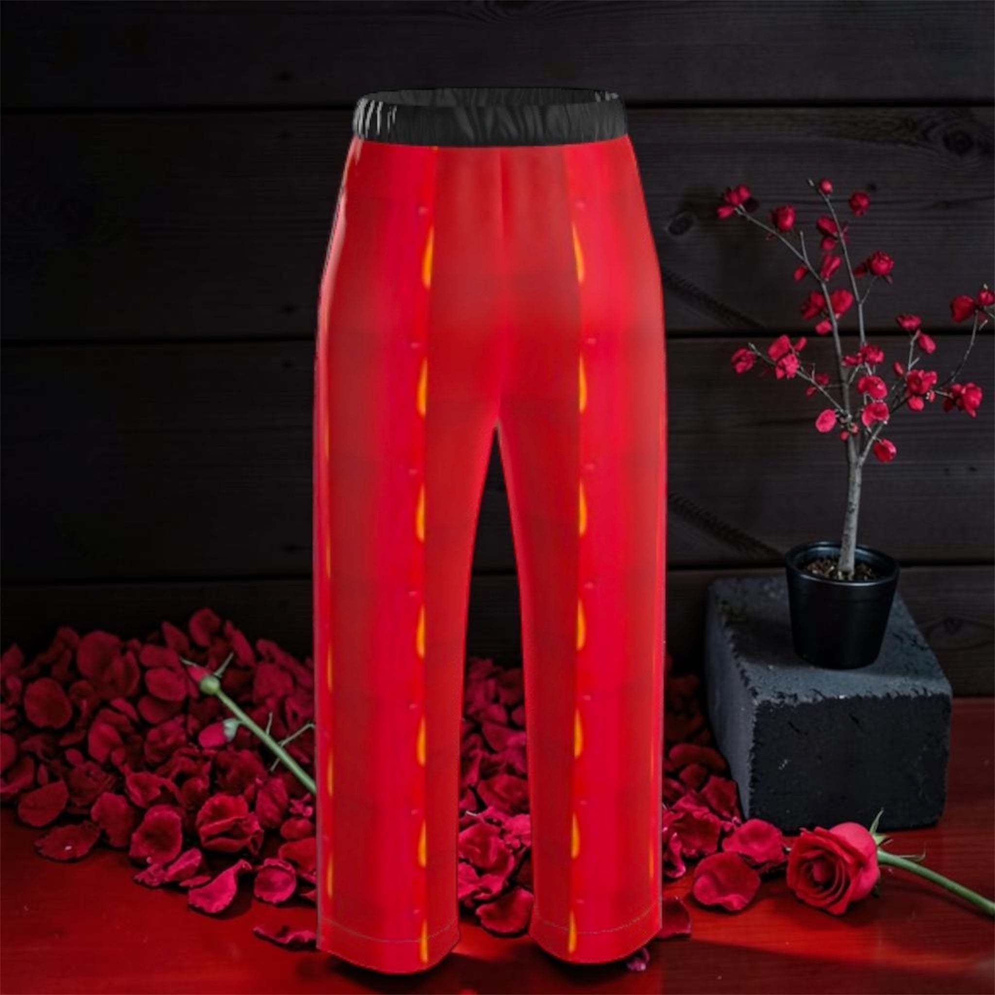 Vol IV — The Royal Play Silk Pants, back view, scarlet red all-over flame panel with gold detail, black elastic waistband, rose petal editorial — Golden Expression Art
