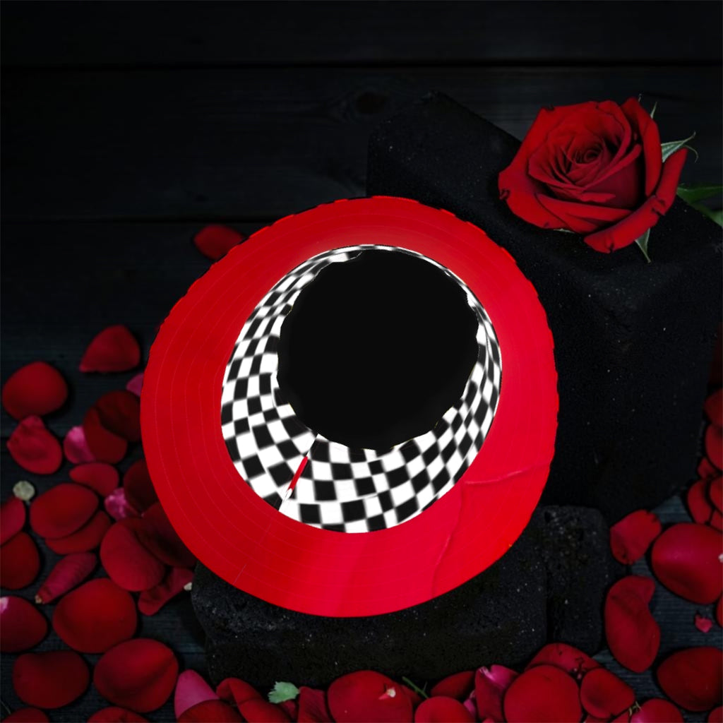 Vol IV — The Two-Sided Crown Reversible Bucket Hat, top-down view, solid scarlet red exterior with black & white checkered brim lining, rose petal editorial — Golden Expression Art

