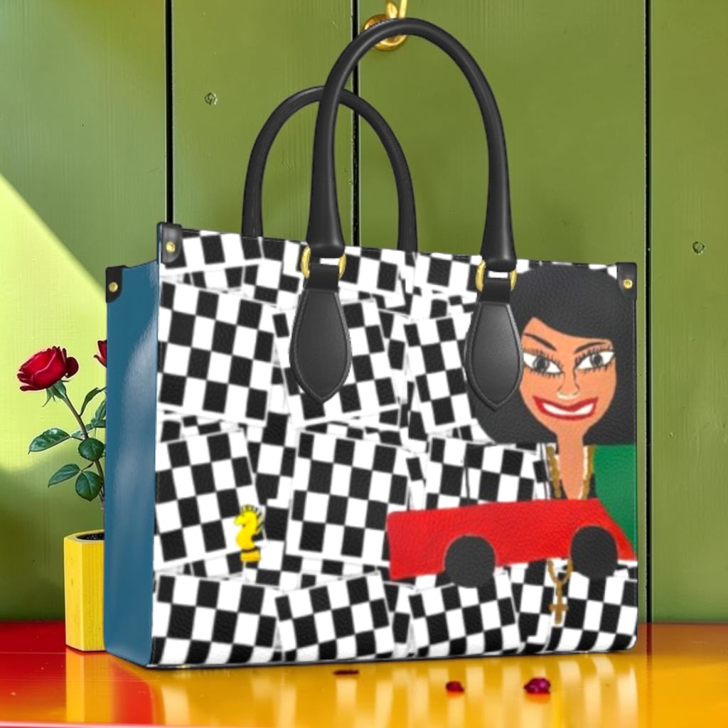 Vol I — The Isis Tote — Checkmate print front with Isis figure, black handles, gold hardware
