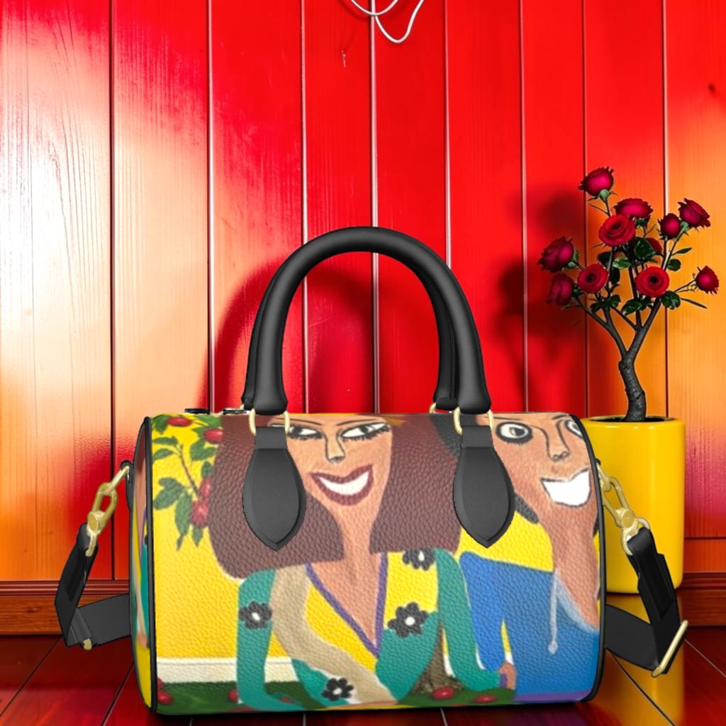 Vol II — The Eden Mini Duffel, back view, Doll Wall golden lady and king art print, textured leather, adjustable black crossbody strap, gold zipper closure, GEA