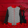 The Double Crown Bomber Jacket — front view: black and white checkered body, solid black sleeves, scarlet red collar cuffs and hem, center zip