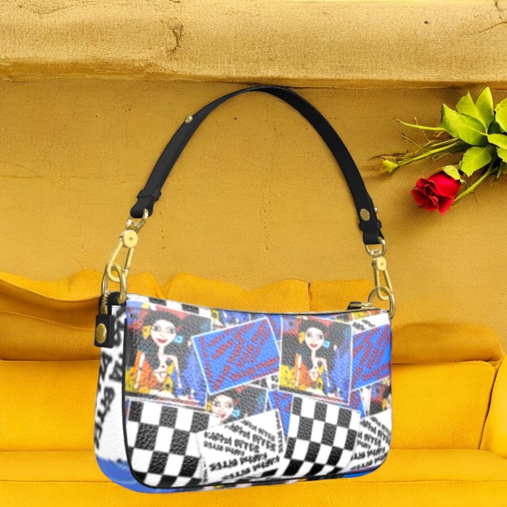 Front view of The Plot Twist Baguette Bag with Checkmate blocks, illustrated portraits, graphic text, and a slim black shoulder strap
