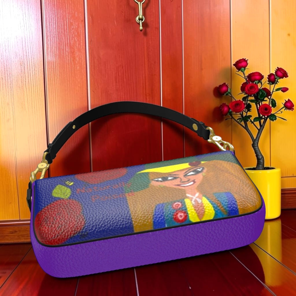 The Scarlett Grab & Go Bag — top-down view, Doll Wall golden figure close-up, black handle, yellow wall backdrop