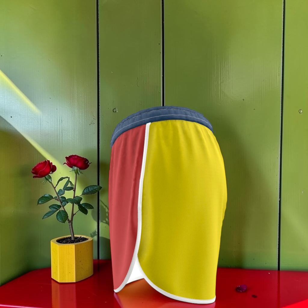 The Golden Rule Short — Side view showing scarlet red and golden yellow split