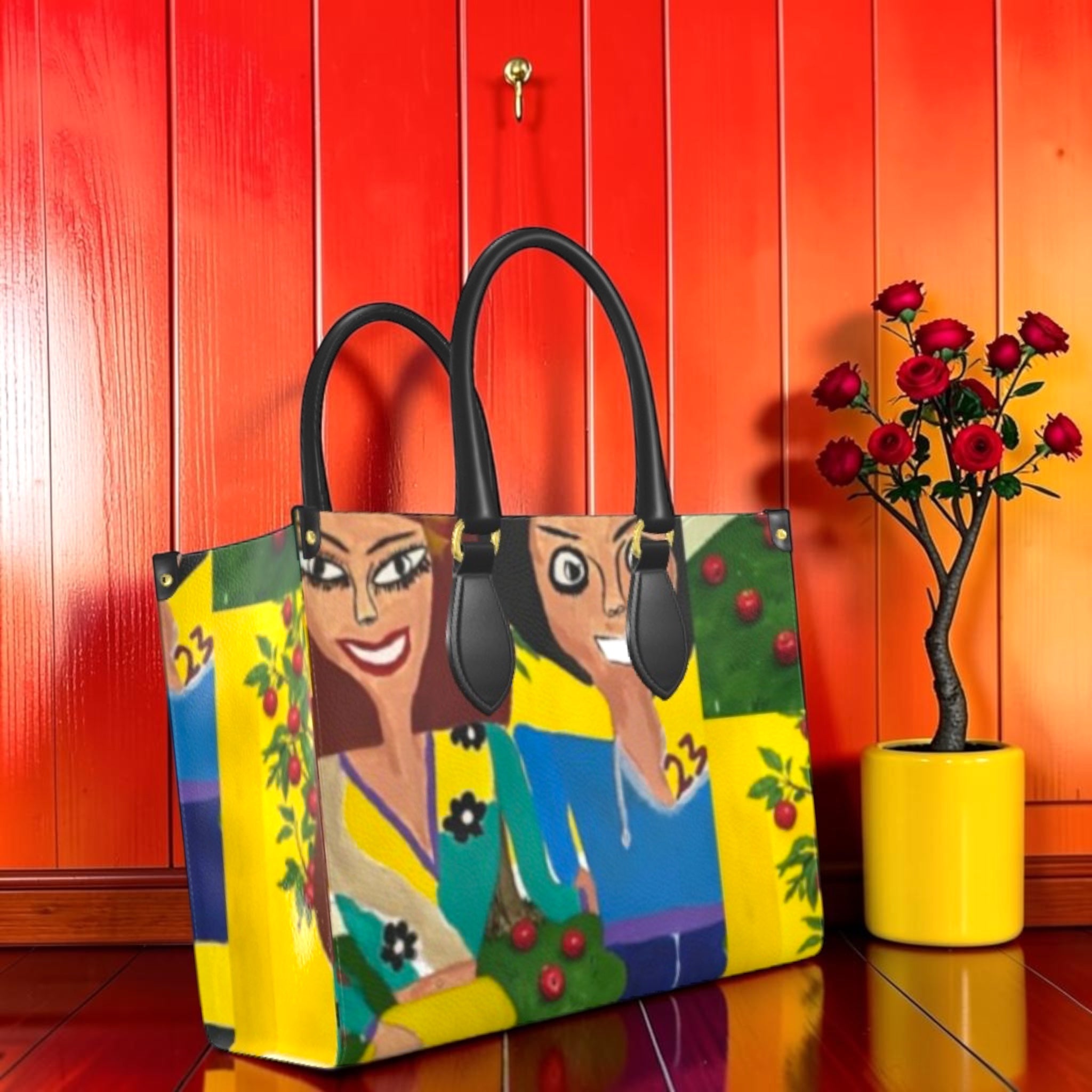 Vol II — The Eden Garden Satchel Tote side view featuring two Doll Wall figures on golden yellow and teal panels — Golden Expression Art Eden Edit