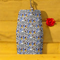 The Effortless Classic Pencil Skirt in Checkmate DNA + Doll Wall collage print, cerulean blue and black & white checker, front view — Vol III The Unbothered Edit by Golden Expression Art