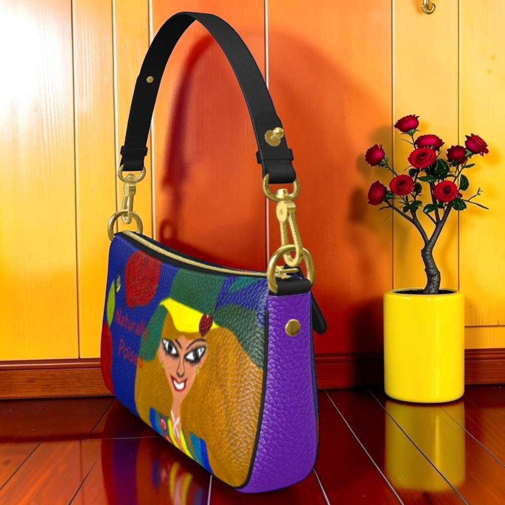 The Scarlett Grab & Go Bag — side profile, scarlett red panel & gold clasp detail, yellow wall backdrop