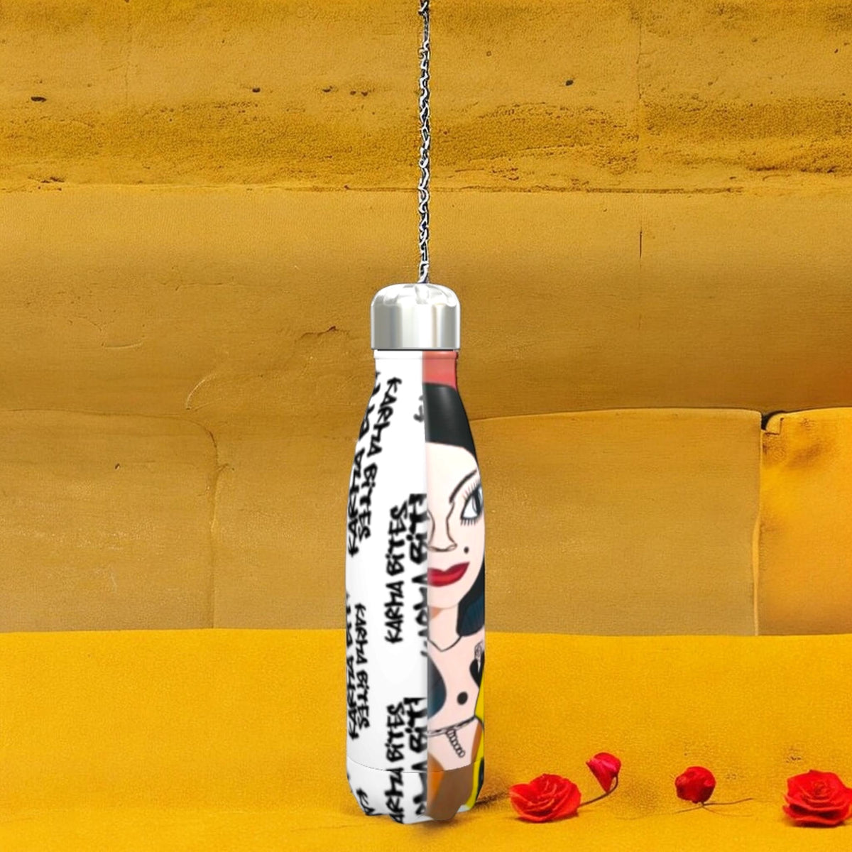 Side view of The Karma Bites Collector’s Water Bottle showing Karma Bites and Doll Wall artwork