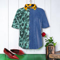 The Untamed Authority Silk Shirt front with teal animal print, denim-look blue panel and yellow leopard collar