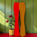 The Golden Rule Flare (High Waisted) — Scarlet red and golden yellow color-block split panel, high waisted flare silhouette, Vol I Golden Expression Art