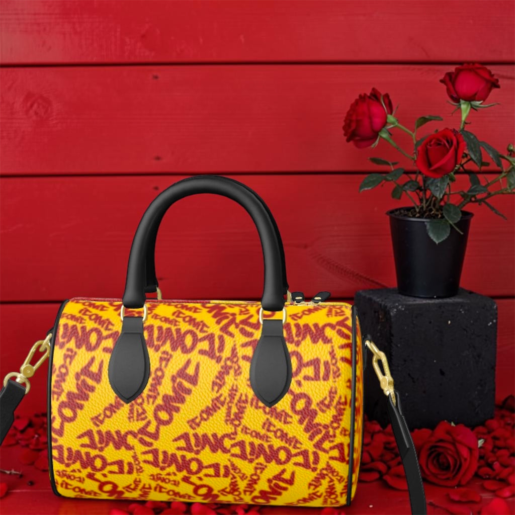 The ICONIC Venture Mini Duffel — full ICONIC all-over print view, golden yellow with scarlet red lettering