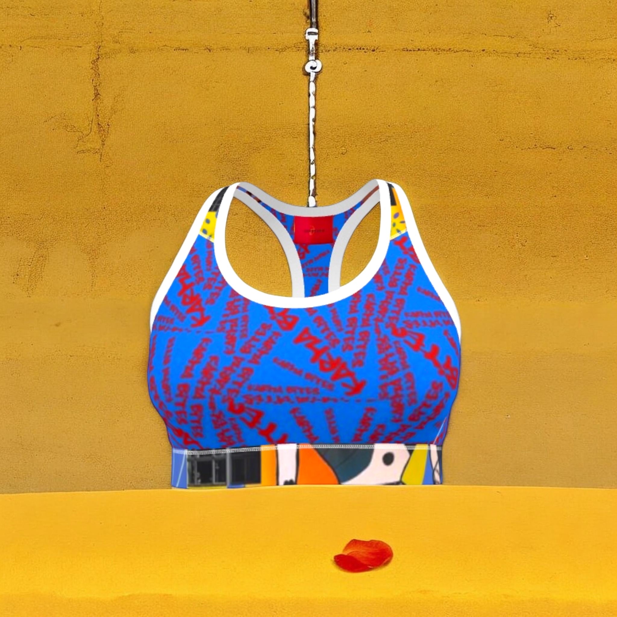 Vol III Karma Bites Bra — all-over Karma Bites graffiti script, cerulean blue body, scarlet red lettering, Doll Wall collage waistband, white racerback straps — Golden Expression Art