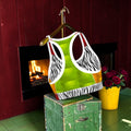 Back of racerback bra with bright green panel, zebra-print sides and white trim