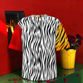 Zebra-print side of color-block tee with red and golden-yellow animal-print sleeves