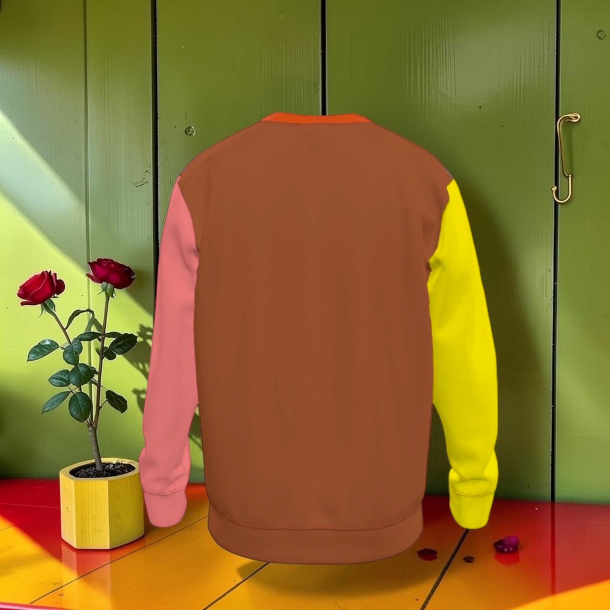 The Colour Rule Shirt — terracotta body with pink left sleeve and yellow right sleeve, orange collar, back view
