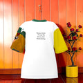 Ambient Oversize Tee — back view showing affirmation text and Doll Wall art sleeve, Vol II The Eden Edit