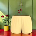Vol I — The Crisp Short in Butter Yellow, front view