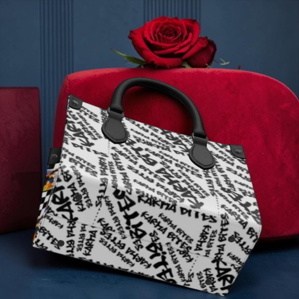Vol III Karma Bites Satchel Tote — Karma Bites graffiti print side view, black corner hardware detail — Golden Expression Art