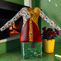 The Crimson Instinct Cardigan front with floral sleeves, golden leopard panel and red color-blocking