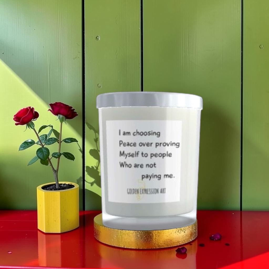 The Sovereign Calm Candle — frosted glass vessel with peace affirmation label, red rose, gold coaster, green wall backdrop — Golden Expression Art Vol I