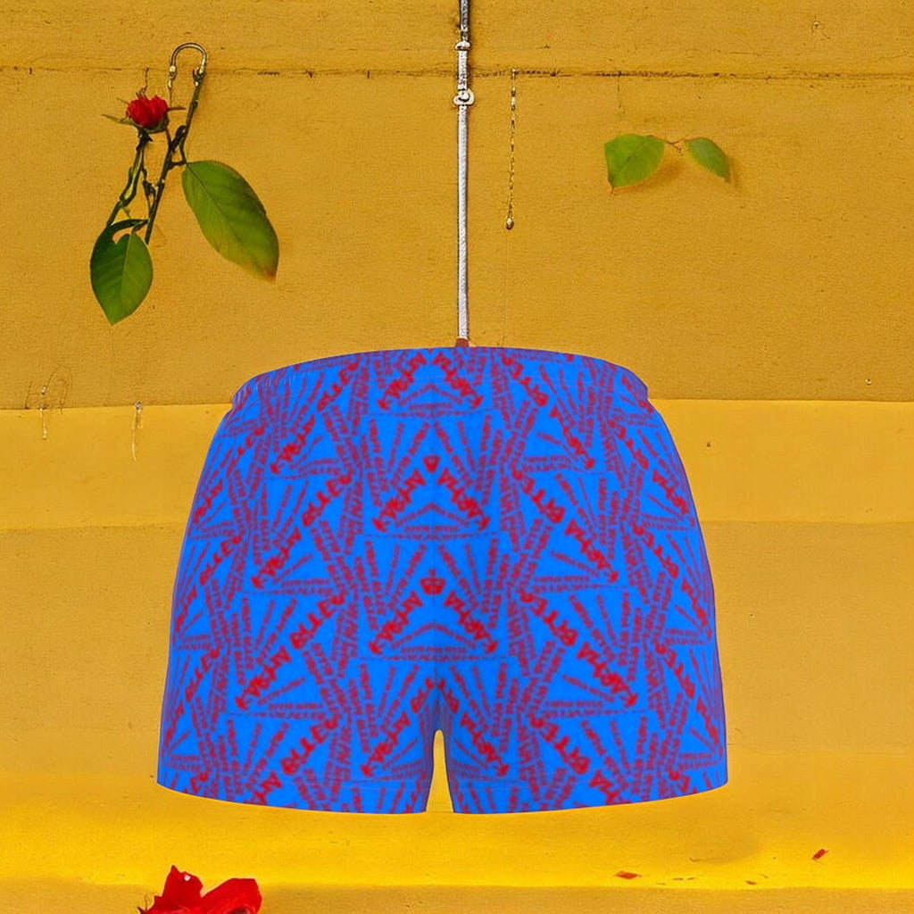Vol III Karma Bites Mirror Short — all-over mirrored Karma Bites graffiti script, cerulean blue body, scarlet red starburst pattern, high-waisted mini short silhouette — Golden Expression Art