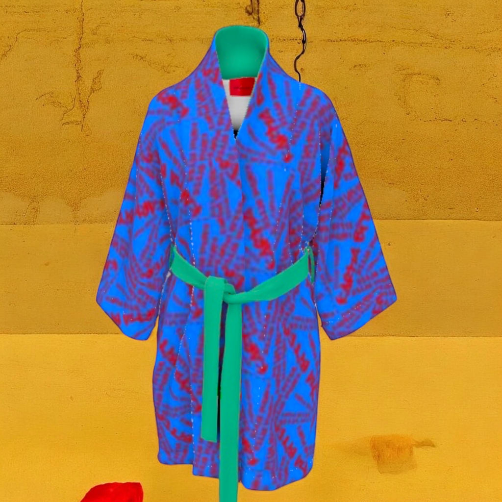 The Unbothered Signature Robe 100% Silk — front view, cerulean blue with scarlet red Karma Bites starburst print and emerald green belt — Vol III The Unbothered Edit by Golden Expression Art