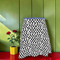 Vol I — The Bold Reign Midi Flare Skirt — Checkmate DNA front view with blue waistband