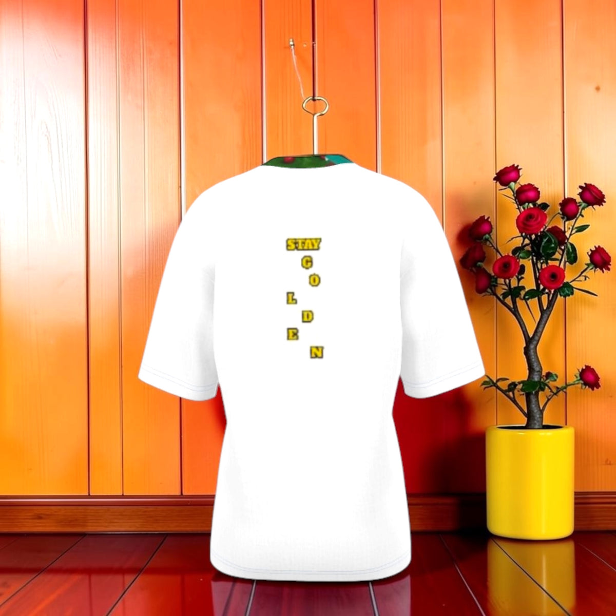 Vol II — Queen Isola Classic Tee, back view, white oversized tee, Eden art painting neckline detail, STAY GOLDEN vertical gold lettering down spine, orange editorial backdrop, Golden Expression Art