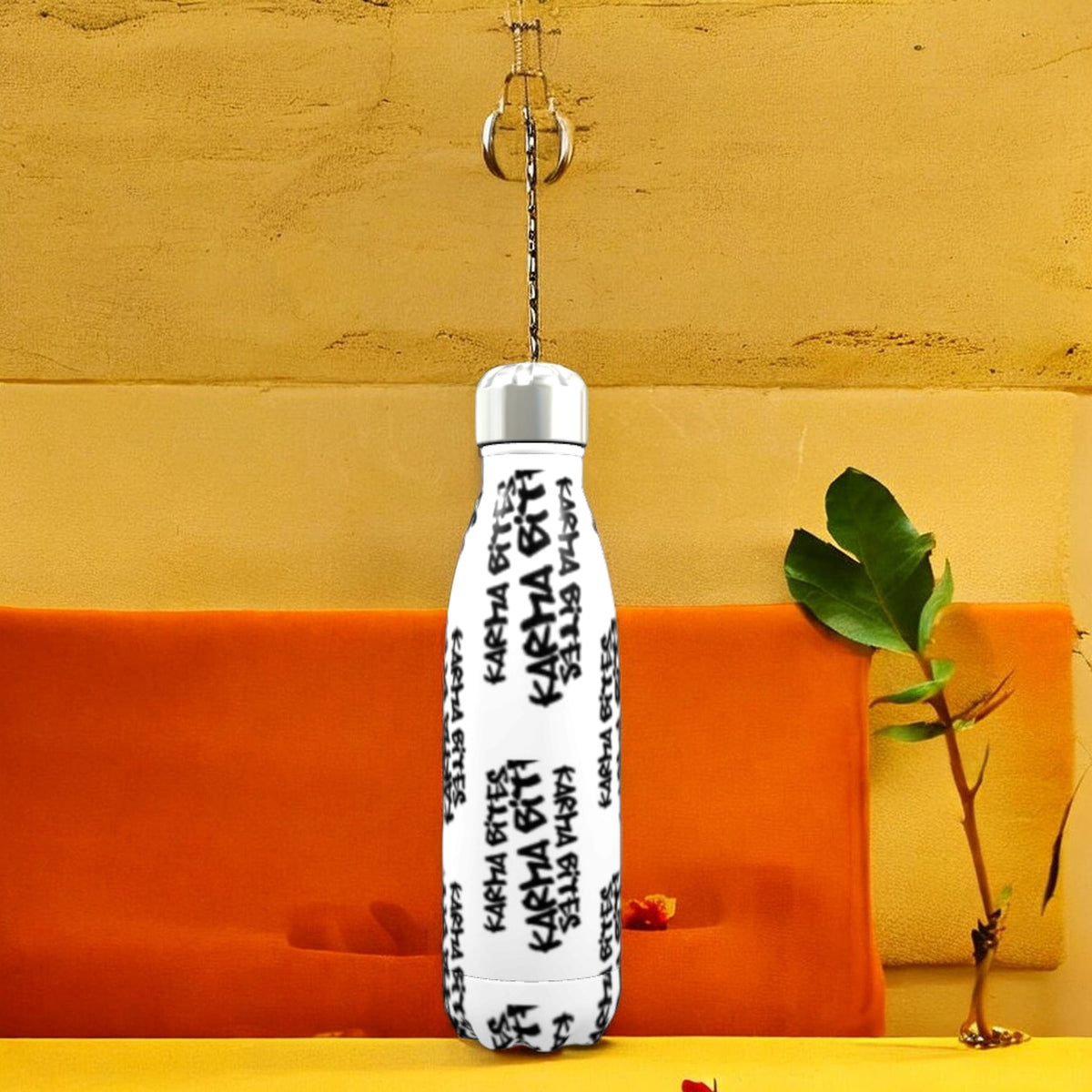 The Karma Bites Collector’s Water Bottle in stainless steel with Karma Bites artwork