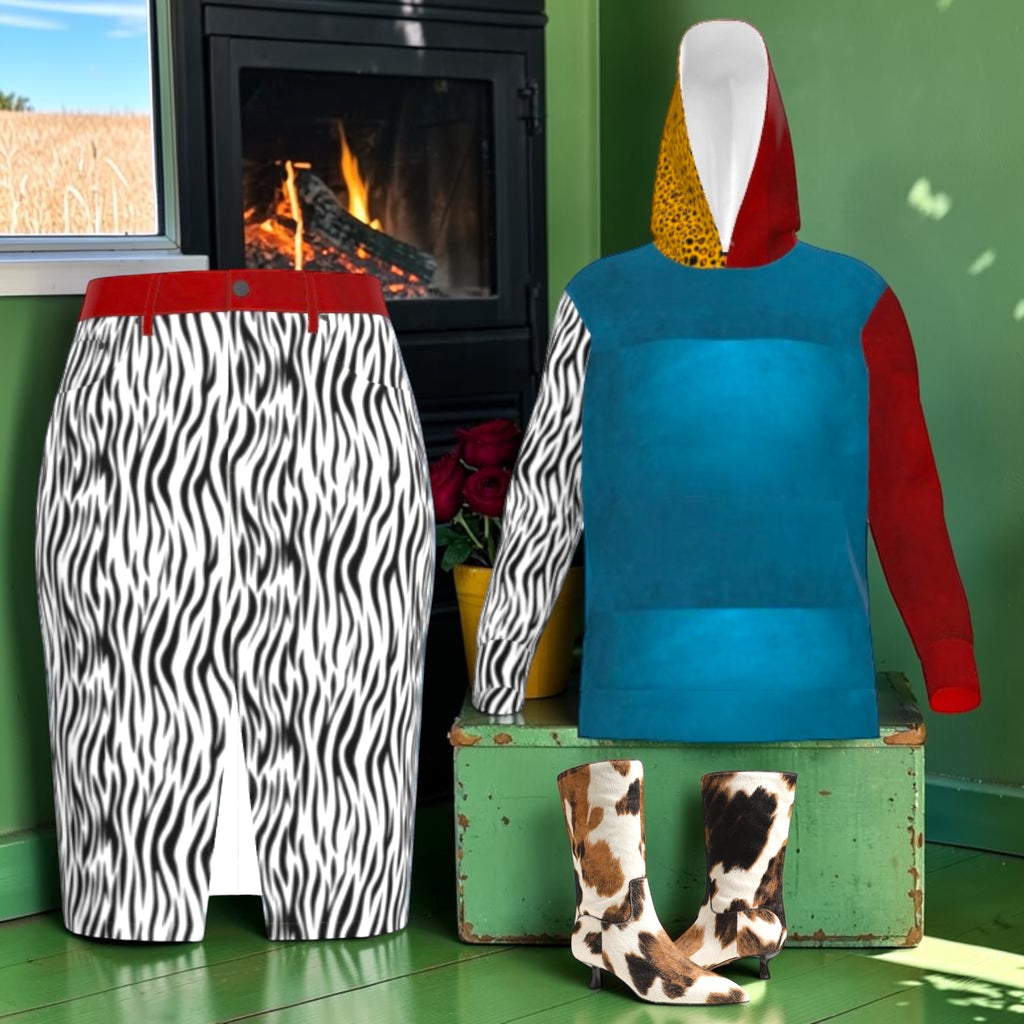 The Rebel Zebra Denim Midi Skirt styled with a color-block hoodie and cow-print boots in a green room with a fireplace