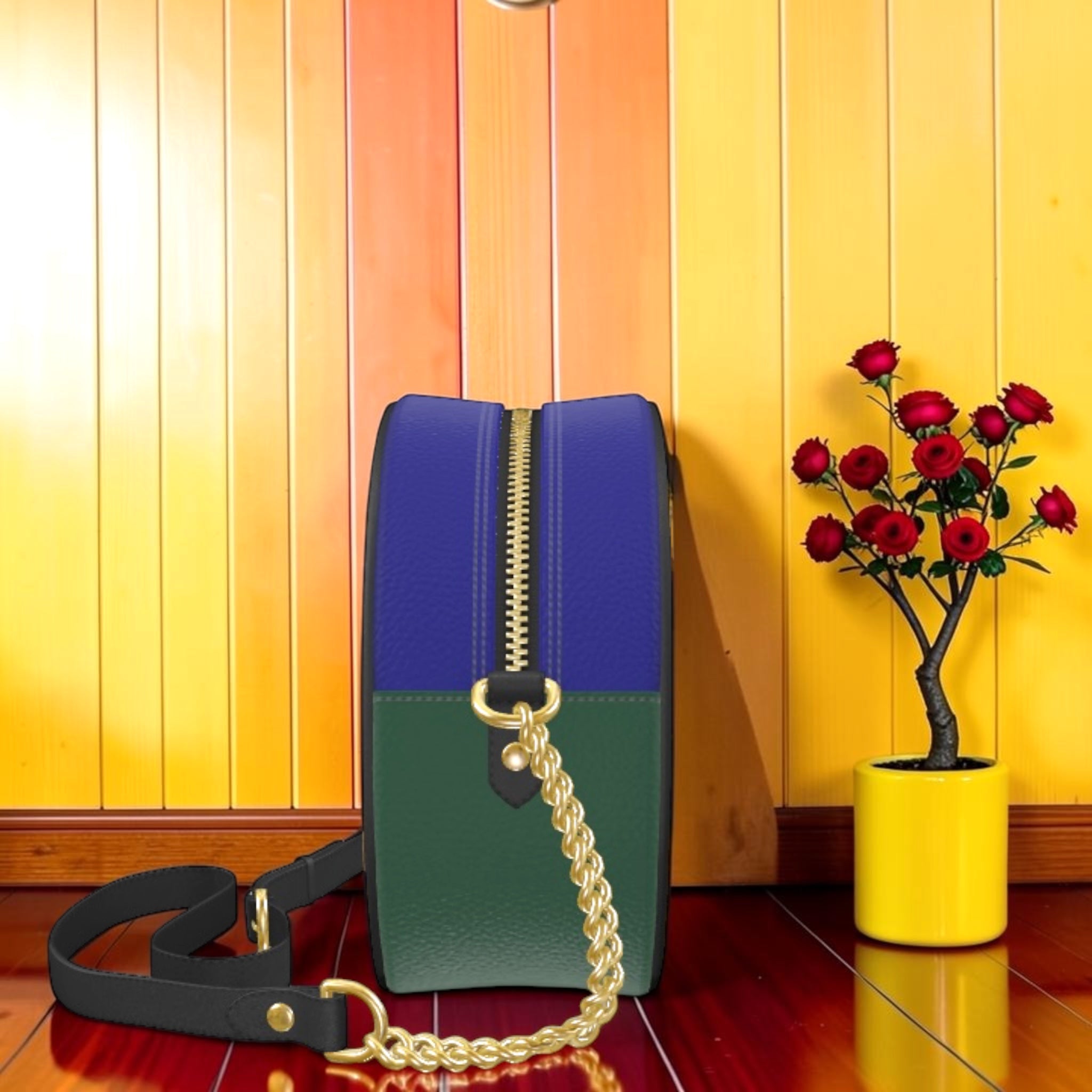 Vol II — The Eden Box Bag, back view, royal blue and forest green Nappa leather color-block panels, gold zipper closure, black adjustable crossbody strap, gold hardware, GEA