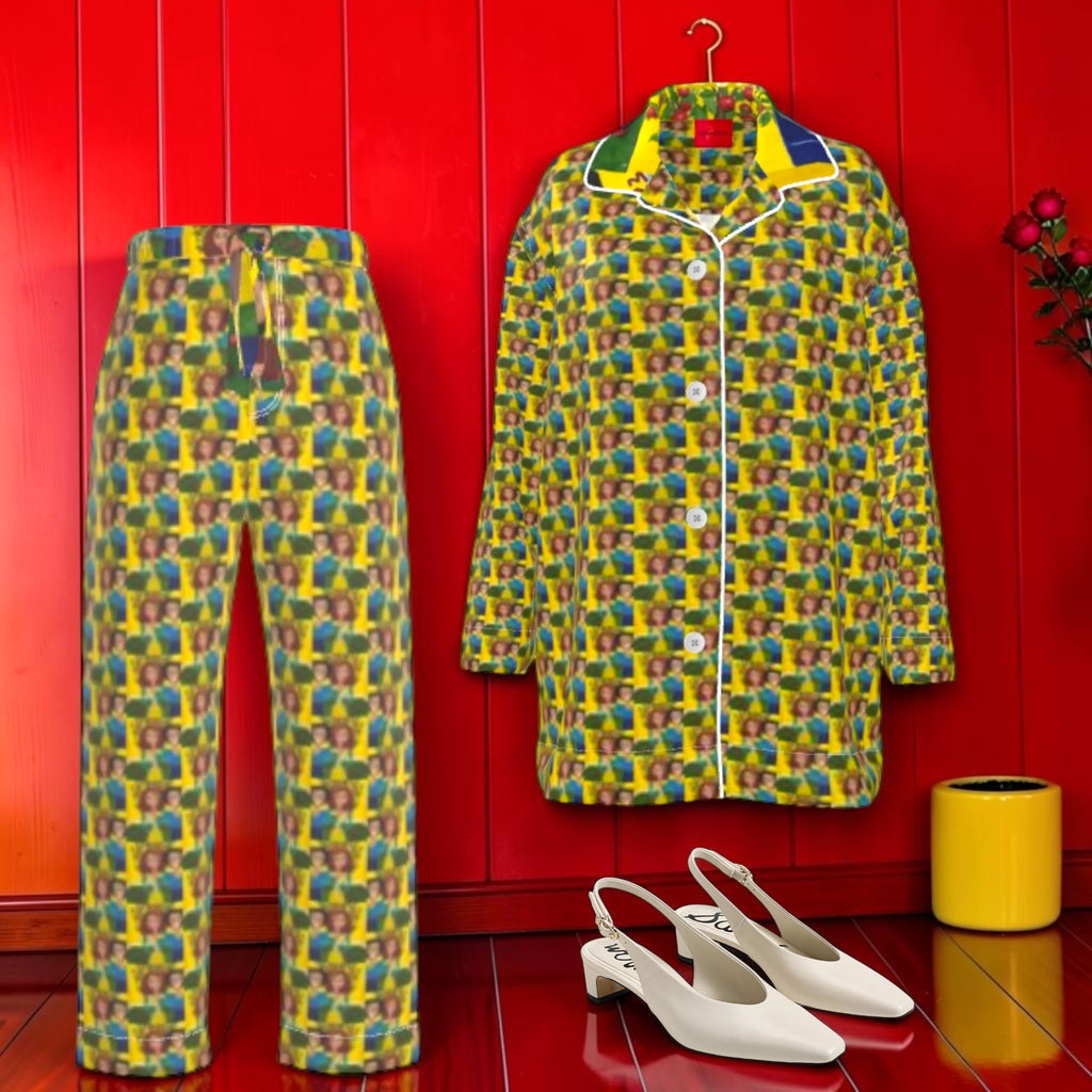 Vol II — The Eden Leisure Set · 100% Silk · All-over Doll Wall print in golden yellow, teal, blue and forest green · Button-down shirt with notched collar and white piping · Matching straight-leg pants · Limited Edition · Golden Expression Art