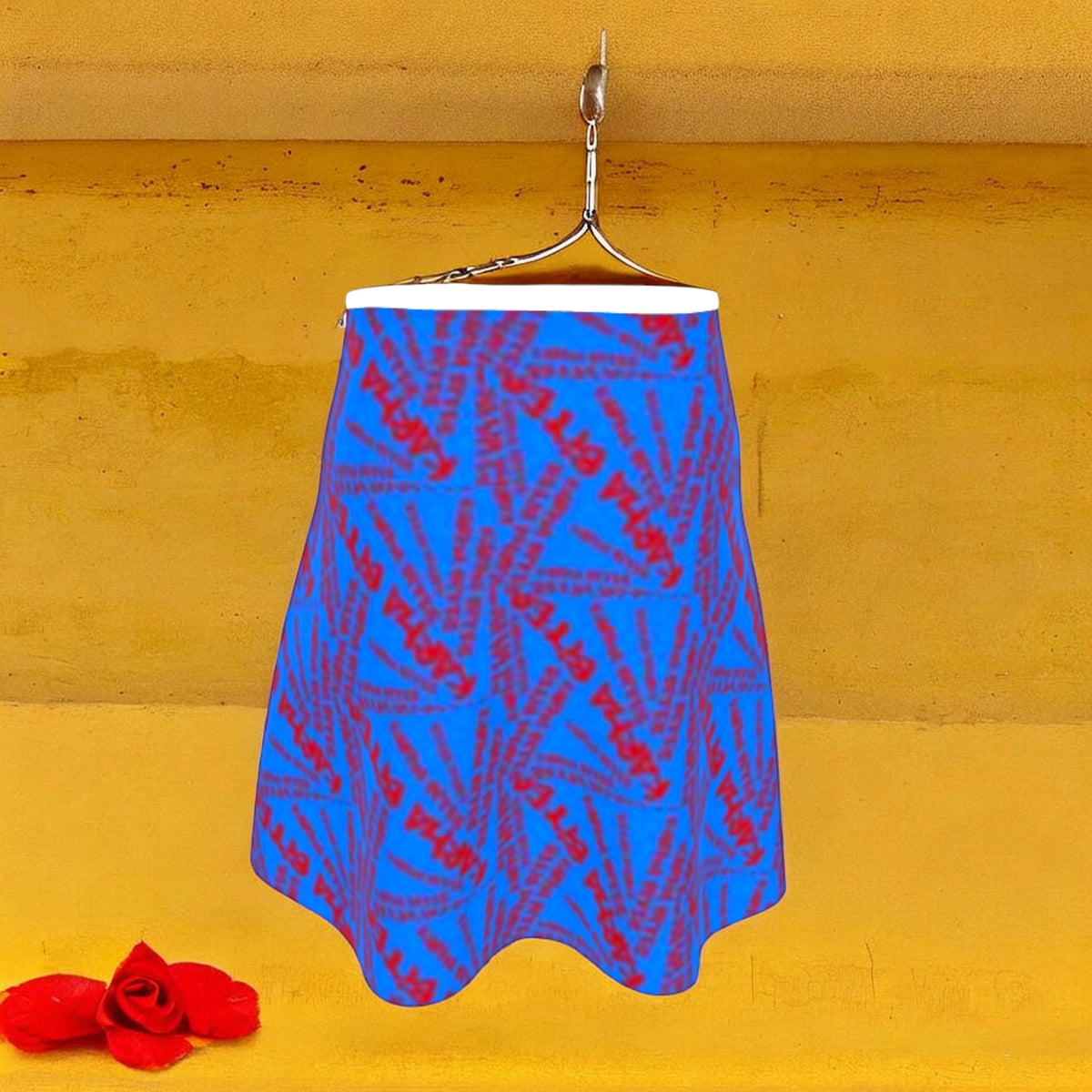 The Unbothered Skirt back view — cerulean blue soft shell skirt with scarlet red all-over print, fluid hem detail. Vol III — The Unbothered Edit, Golden Expression Art.