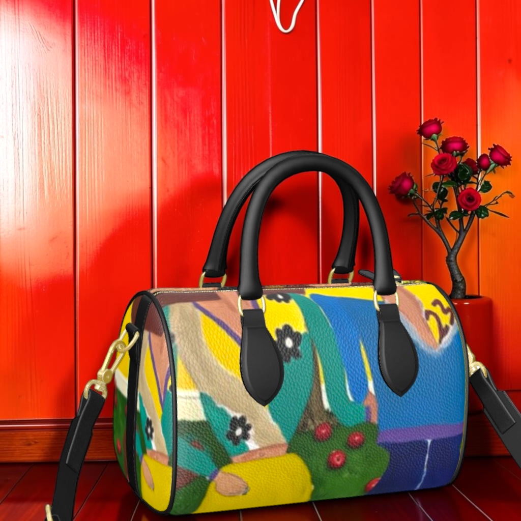 Vol II — The Eden Mini Duffel, front view, all-over Eden art print, abstract botanical and Doll Wall figures, textured leather, structured barrel silhouette, dual black handles, gold hardware, GEA