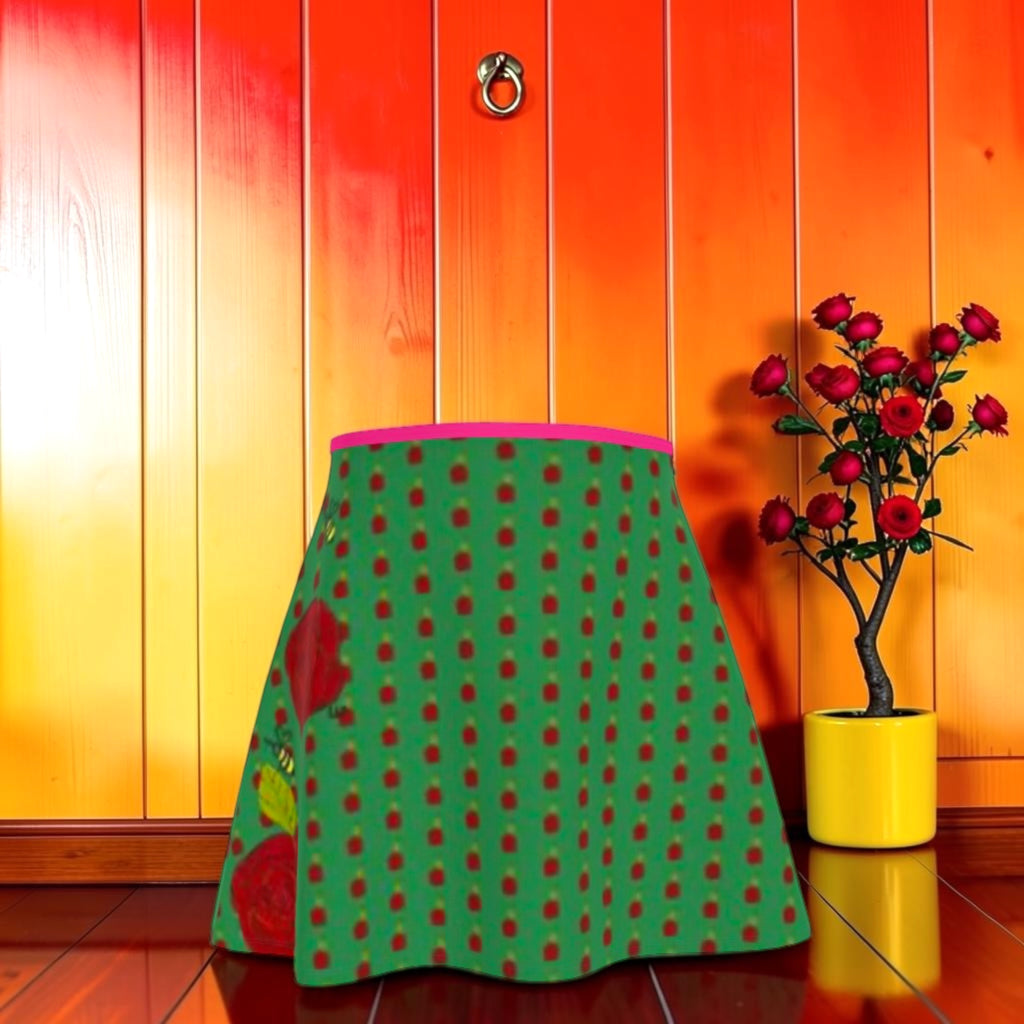 Bella Mini Flare Skirt — emerald green with crimson dot print and magenta waistband, front view, Vol II The Eden Edit