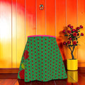 Bella Mini Flare Skirt — emerald green with crimson dot print and magenta waistband, front view, Vol II The Eden Edit